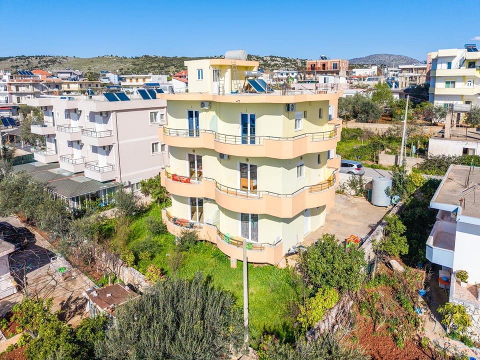 Property building, Spring, Day, Neighbourhood, Natural landscape, City view, Street view, Location