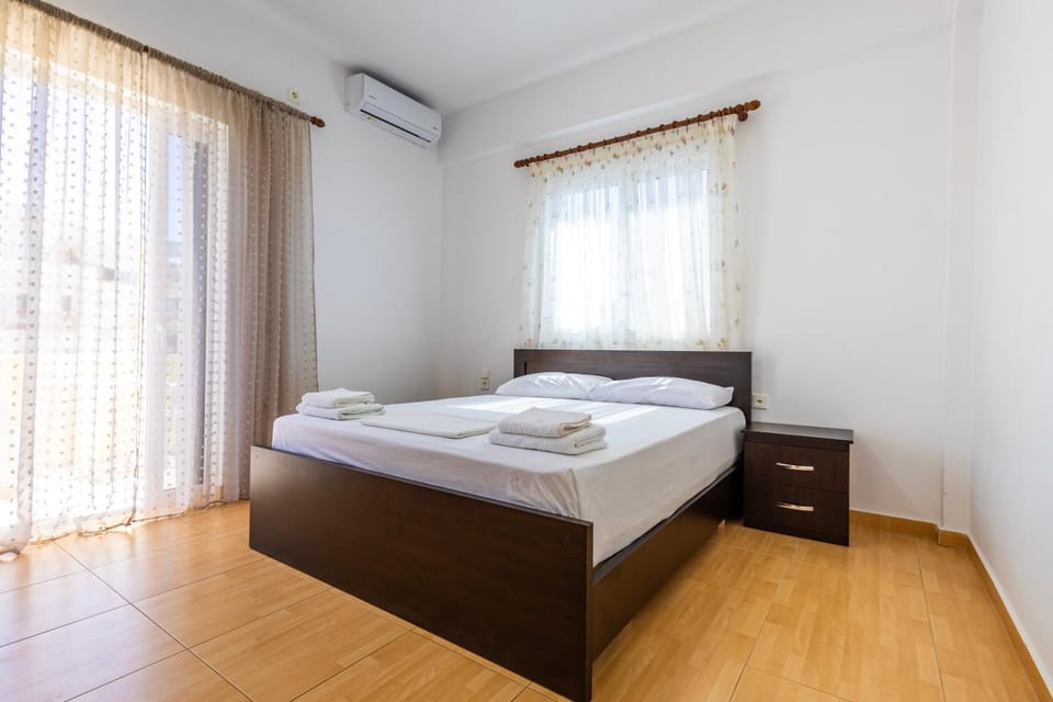 Bed, Photo of the whole room, Bedroom, towels, air conditioner