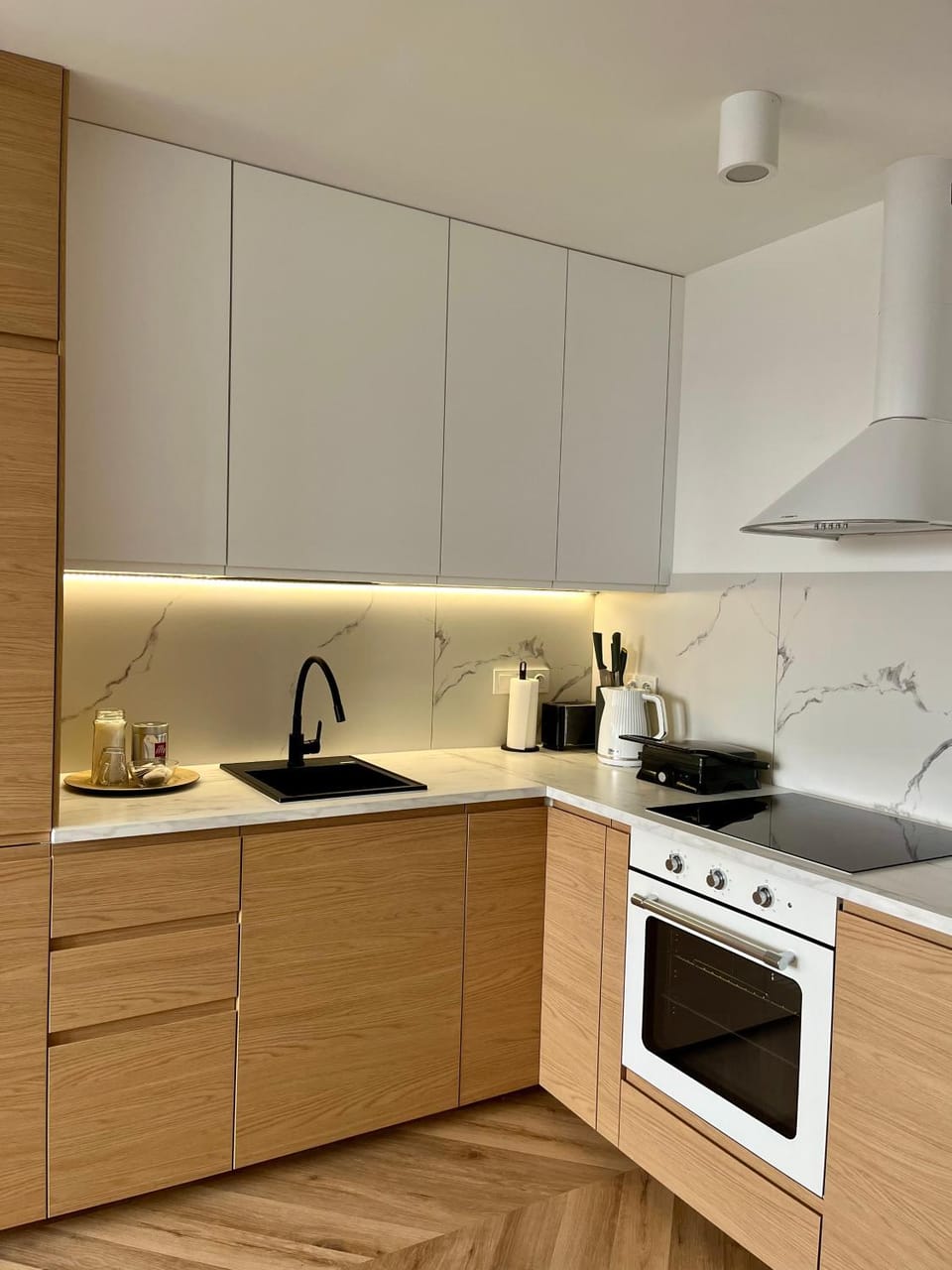 Kitchen or kitchenette, dishwasher, stove, toaster