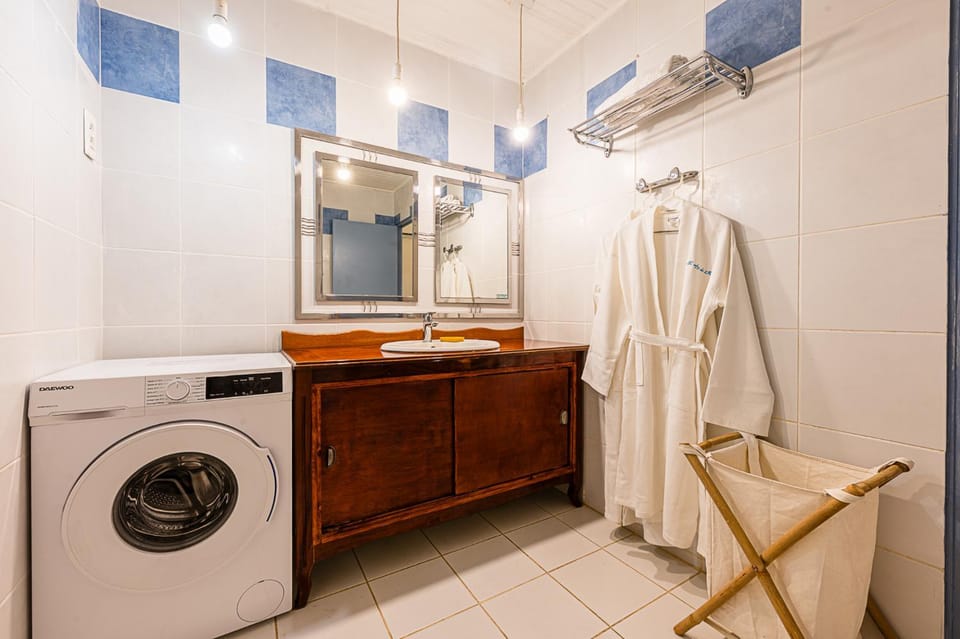 Shower, Bathroom, towels, washing machine, air conditioner