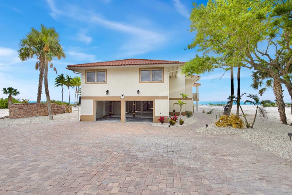 Beachfront Palace Saint Kyrollos VI by Sun Palace Vacations House in Estero Island