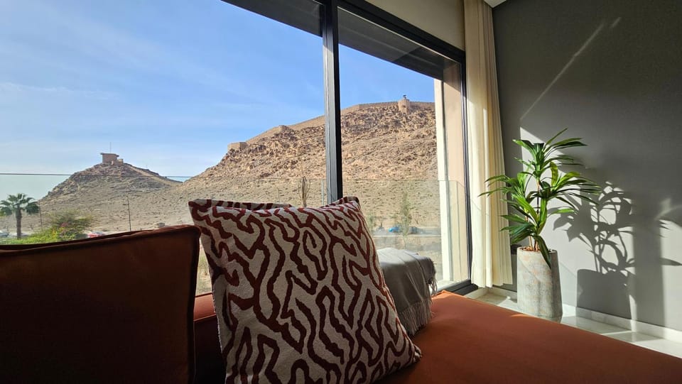 Natural landscape, View (from property/room), Living room, Seating area, Mountain view