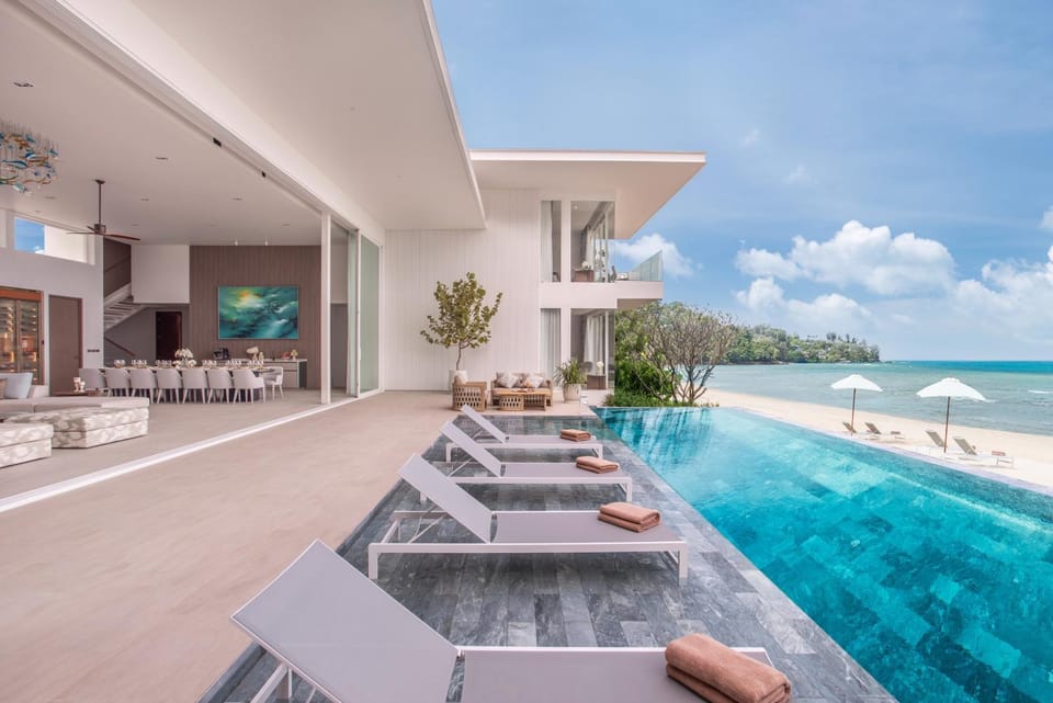 View (from property/room), Living room, Seating area, Dining area, Beach, Pool view, Swimming pool, Swimming pool, sunbed