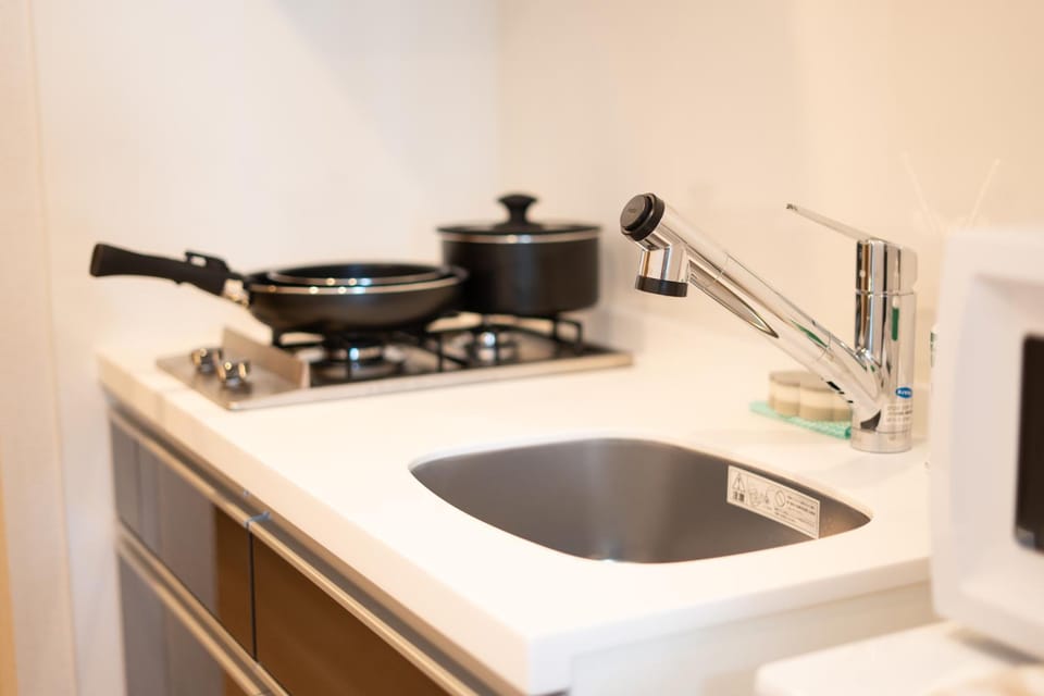 Kitchen or kitchenette, stove
