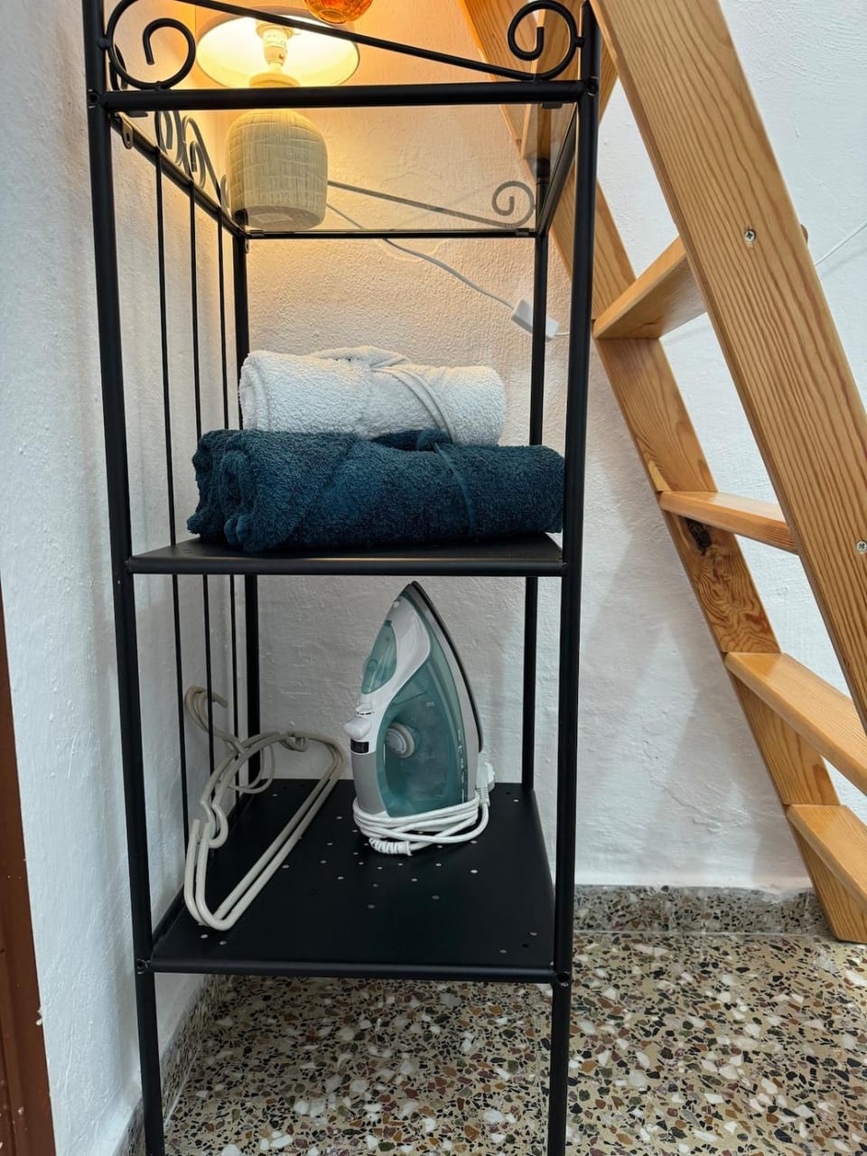 flat iron, furniture, towels