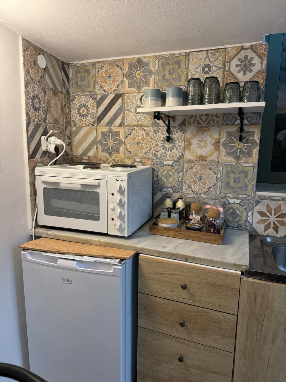 Kitchen or kitchenette, oven, stove