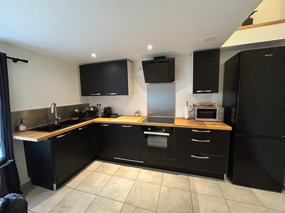 Kitchen or kitchenette, dishwasher, oven, stove, toaster