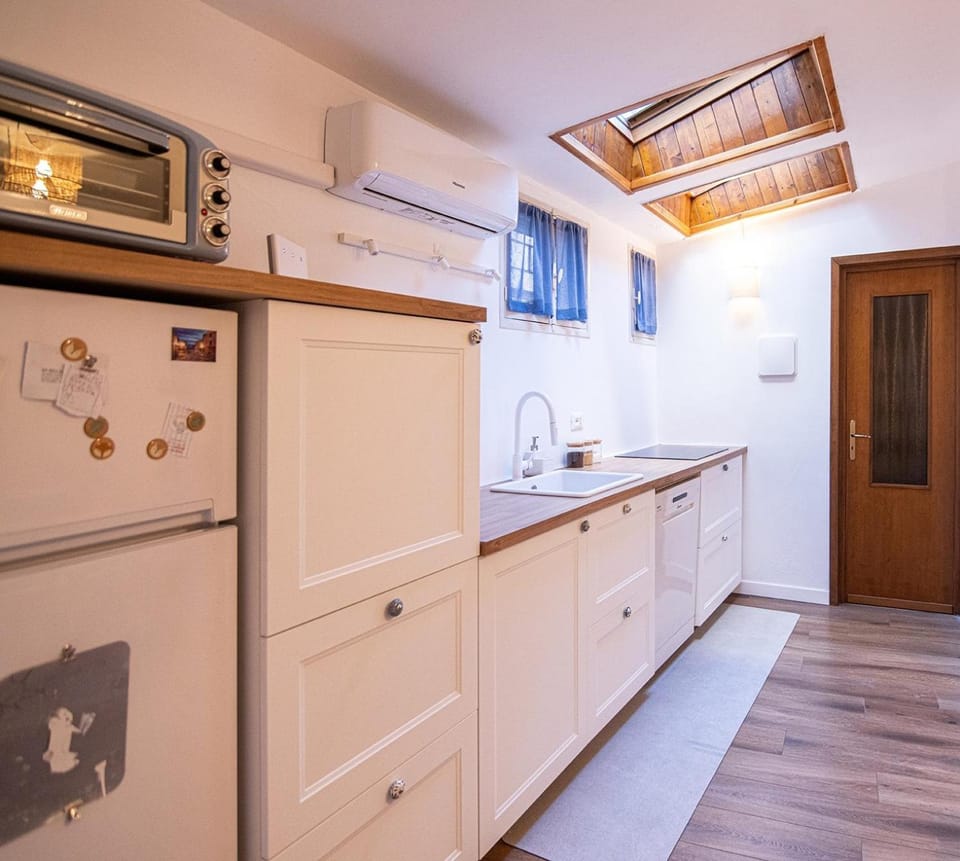 Kitchen or kitchenette, stove, kitchen