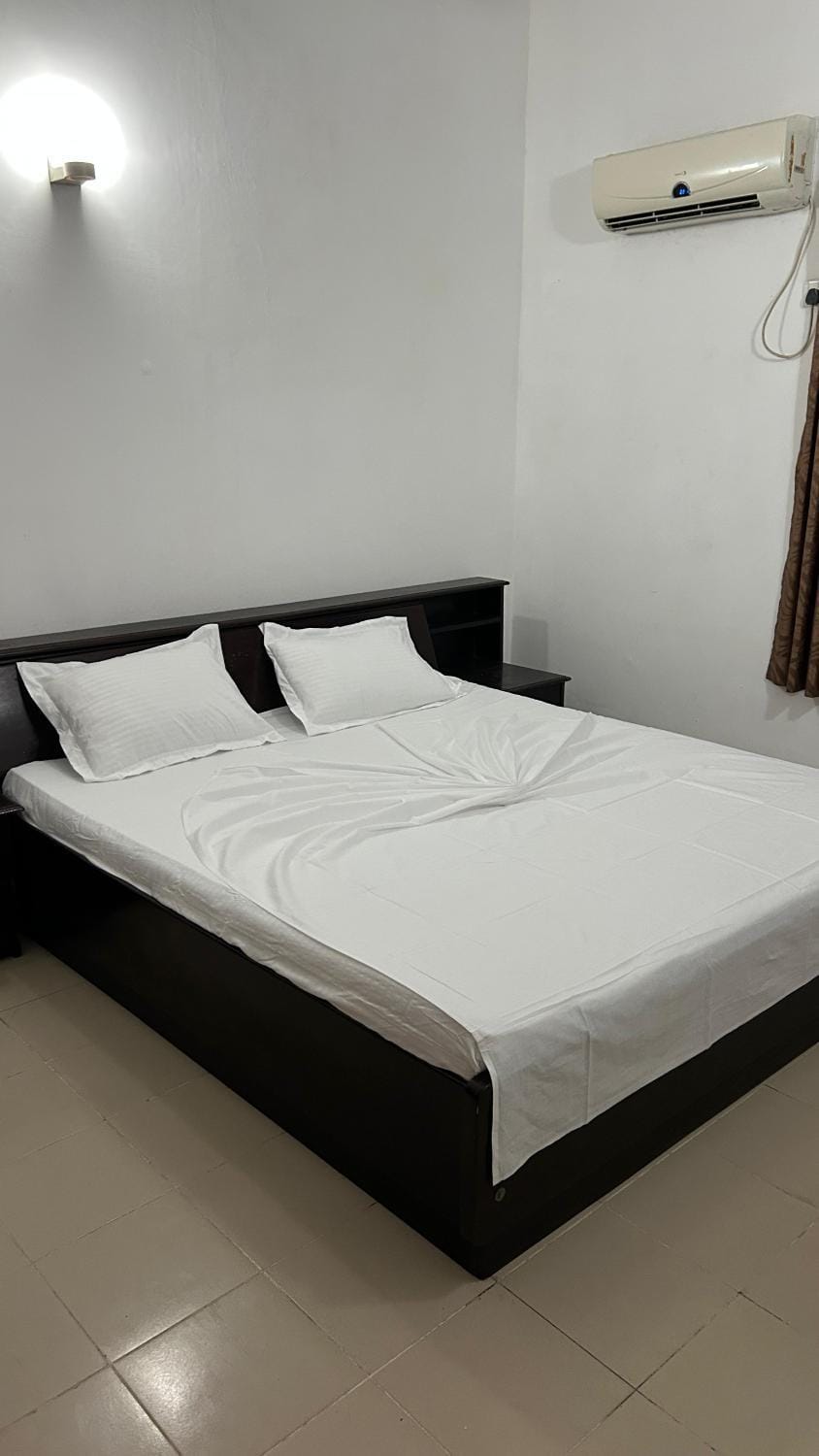 Bed, air conditioner