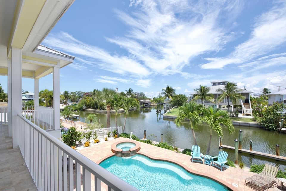 Sandy Getaway by Sun Palace Vacations House in Estero Island