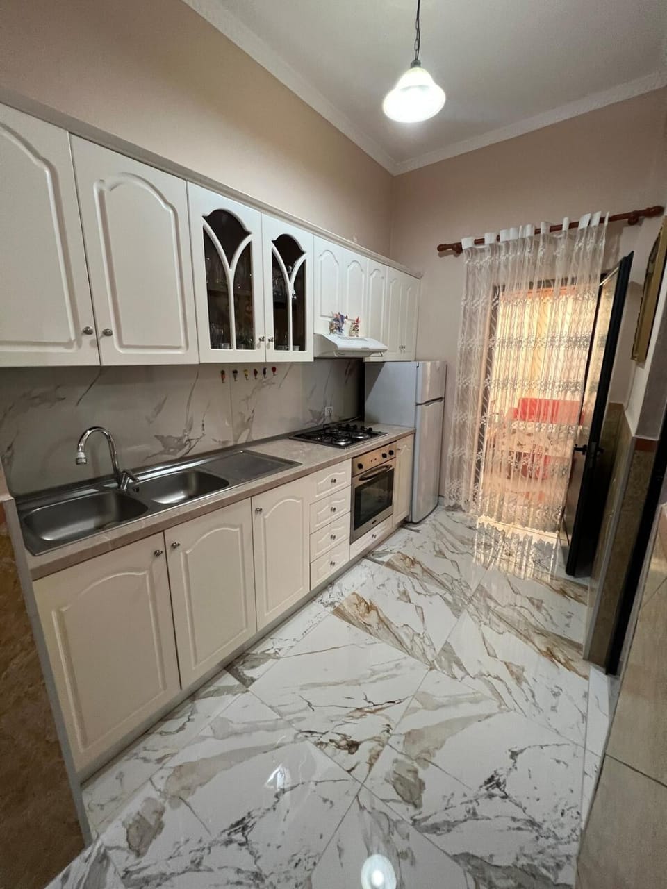 Kitchen or kitchenette, oven, stove