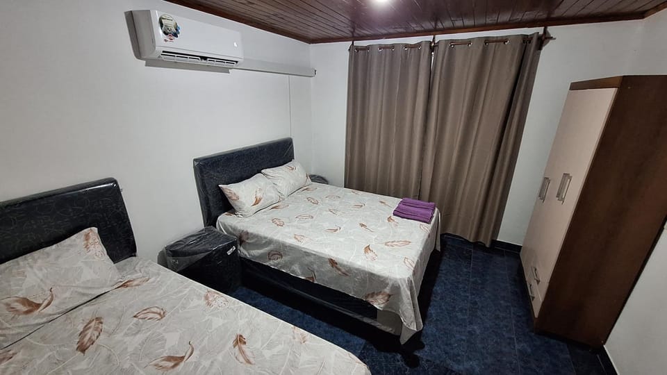 Bed, Photo of the whole room, Bedroom, towels, wardrobe, air conditioner