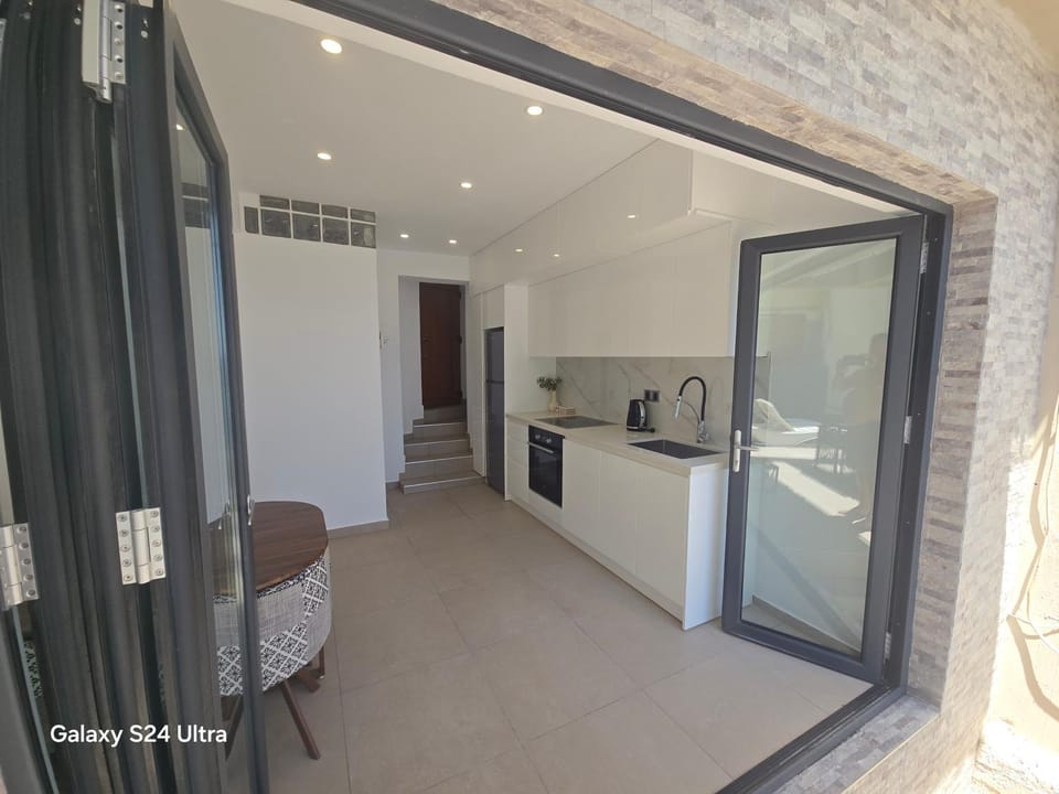 Kitchen or kitchenette, oven, stove
