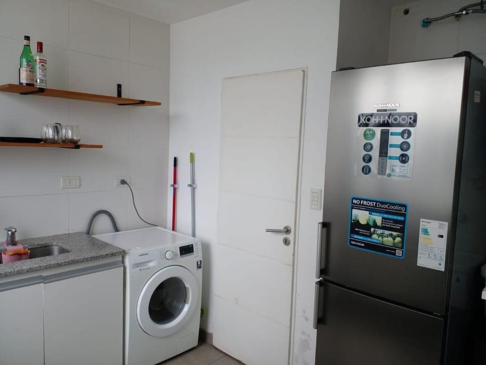 Kitchen or kitchenette, washing machine, dryer