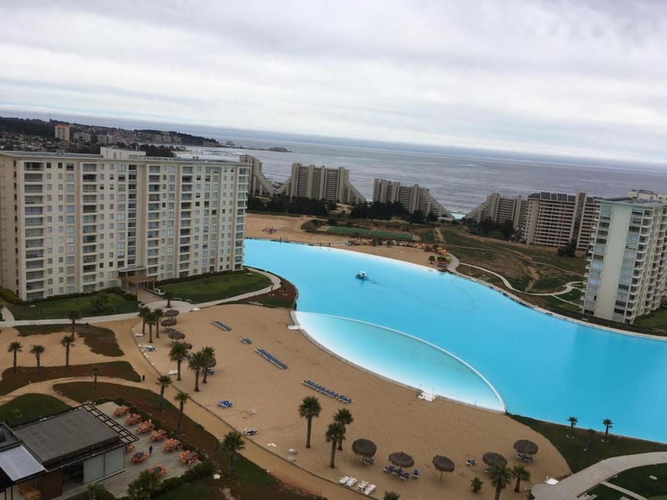 Property building, Natural landscape, Bird's eye view, Beach, Sea view, Swimming pool