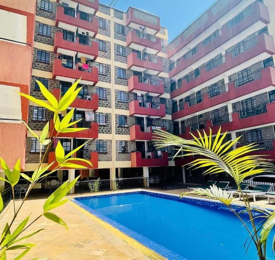 Property building, Day, Pool view, Swimming pool, sunbed