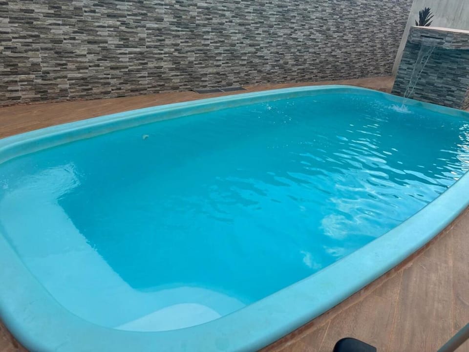 Casa com piscina pé na areia House in Itanhaém