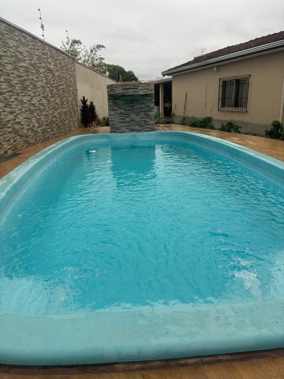 Casa com piscina pé na areia House in Itanhaém