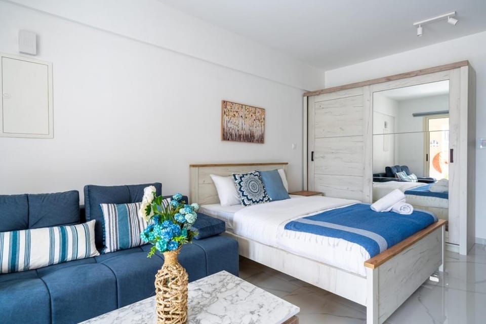 Bed, Seating area, Bedroom, towels, wardrobe, air conditioner