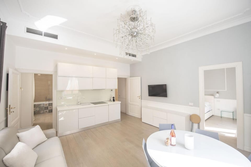 TV and multimedia, Kitchen or kitchenette, Living room, Photo of the whole room, Seating area, Dining area, air conditioner