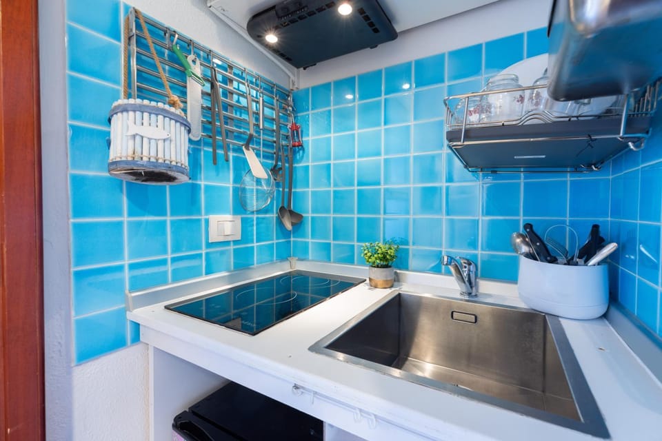Kitchen or kitchenette, stove