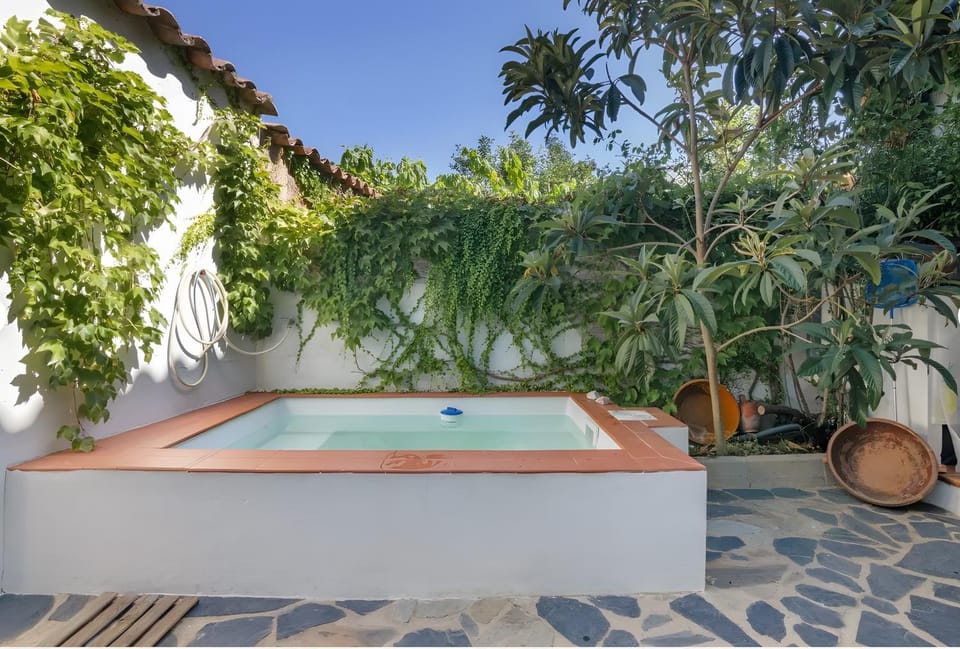 Property building, Living room, Swimming pool
