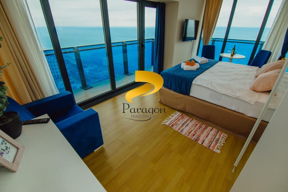 Bed, TV and multimedia, View (from property/room), Seating area, Bedroom, Sea view, towels, air conditioner