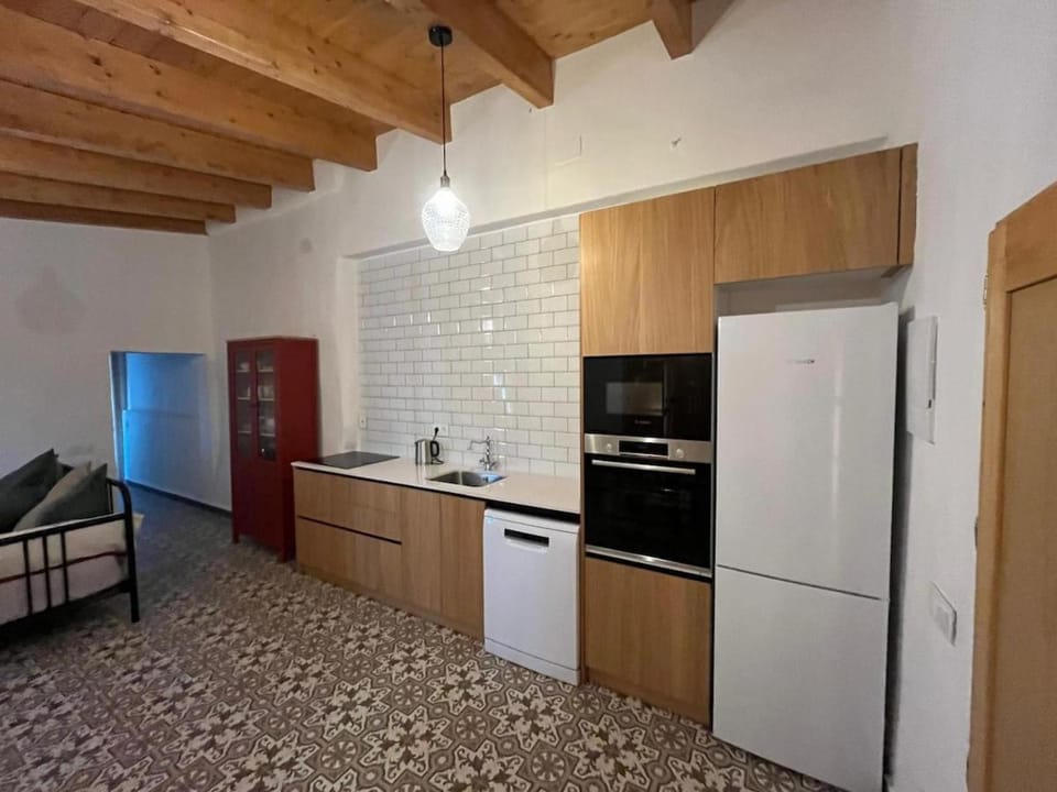 Kitchen or kitchenette, oven, stove