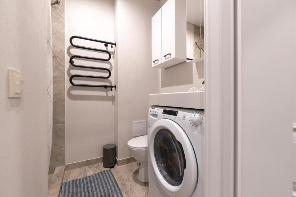 Stylish white salad studio near the city center Apartment in Vilnius