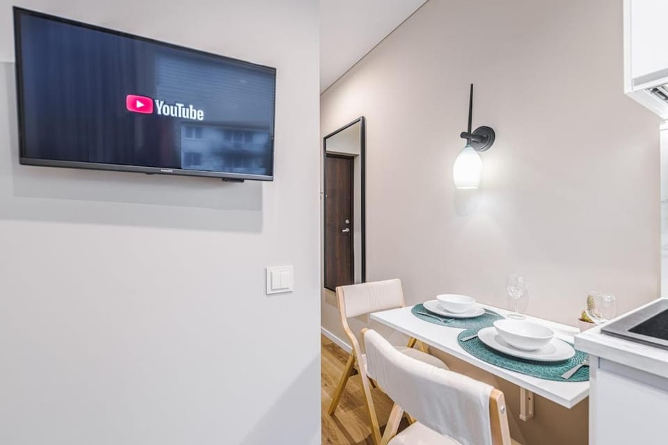 Stylish white salad studio near the city center Apartment in Vilnius