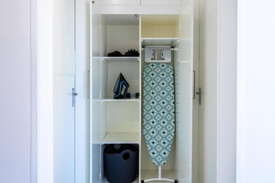 Bedroom, flat iron, hair dryier, wardrobe