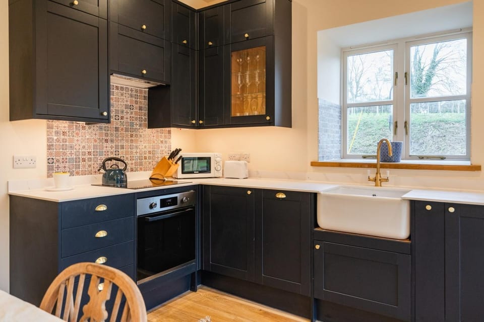 Kitchen or kitchenette, stove, toaster