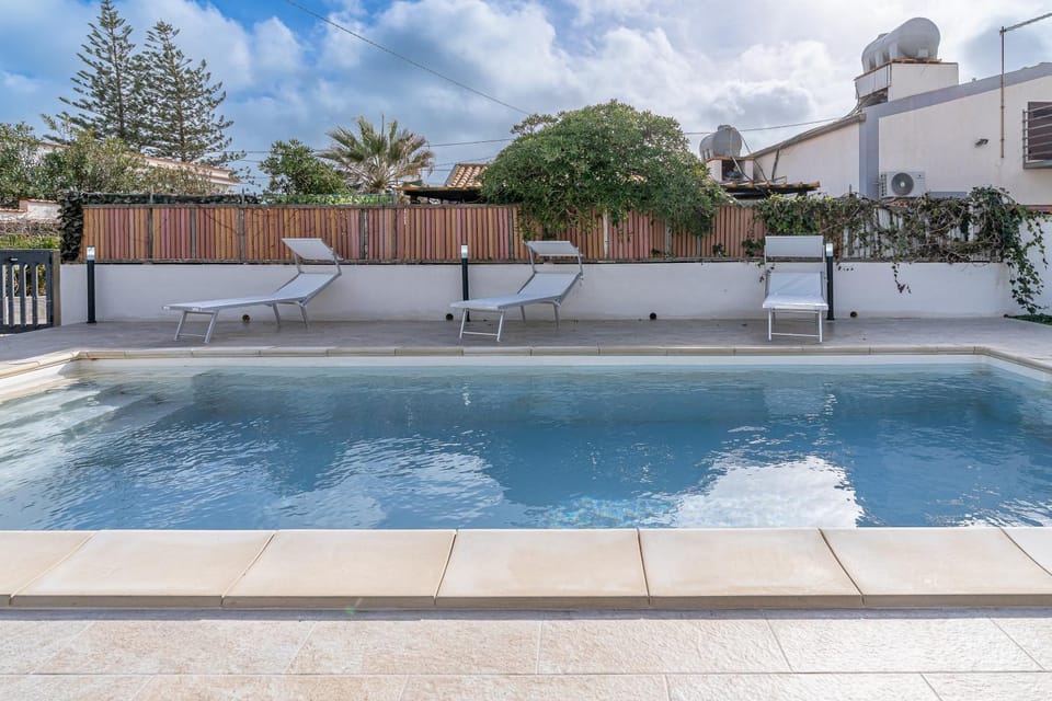 Property building, Living room, Swimming pool