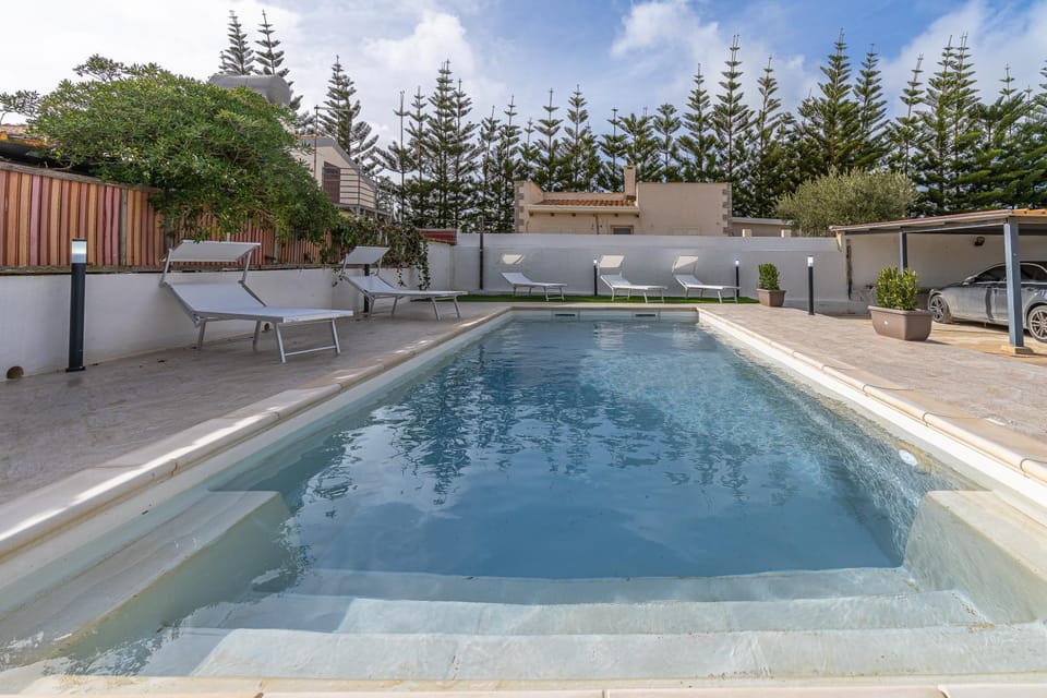 Property building, Living room, Swimming pool