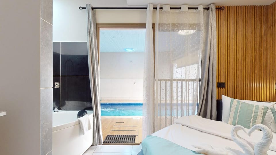 Bed, Hot Tub, Bedroom, Pool view