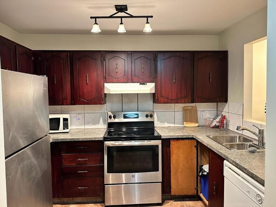 Kitchen or kitchenette, dishwasher, oven, stove, toaster