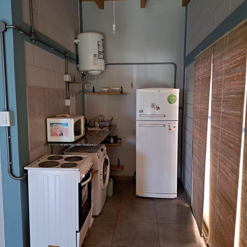 Kitchen or kitchenette, toaster, washing machine