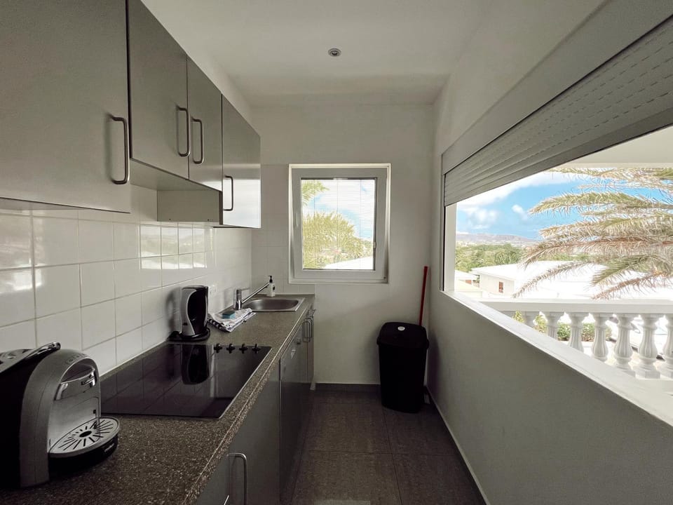 Kitchen or kitchenette, stove