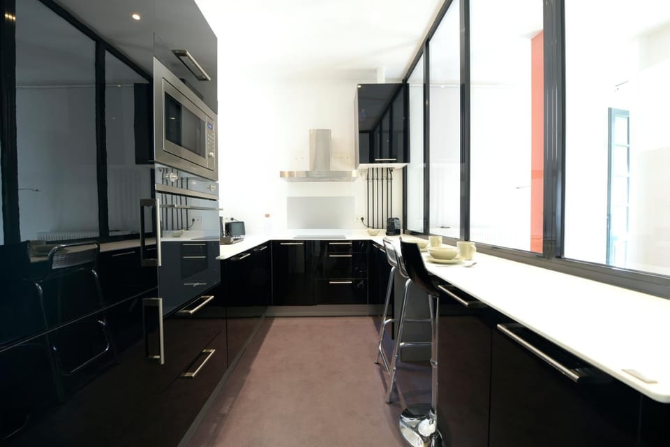 Kitchen or kitchenette, oven, stove