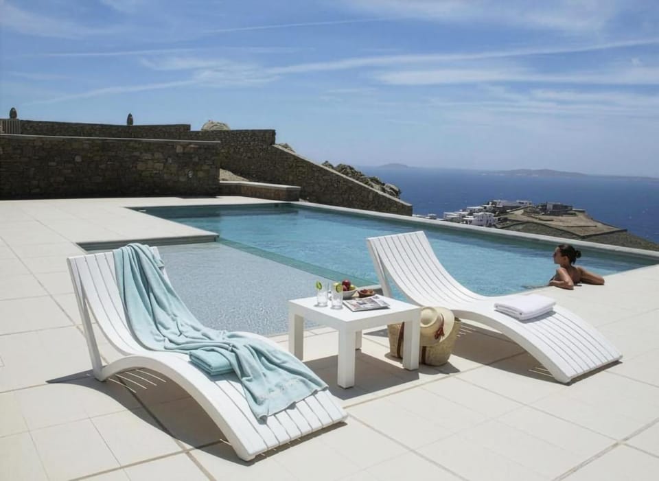Day, View (from property/room), Pool view, Sea view, sunbed, towels