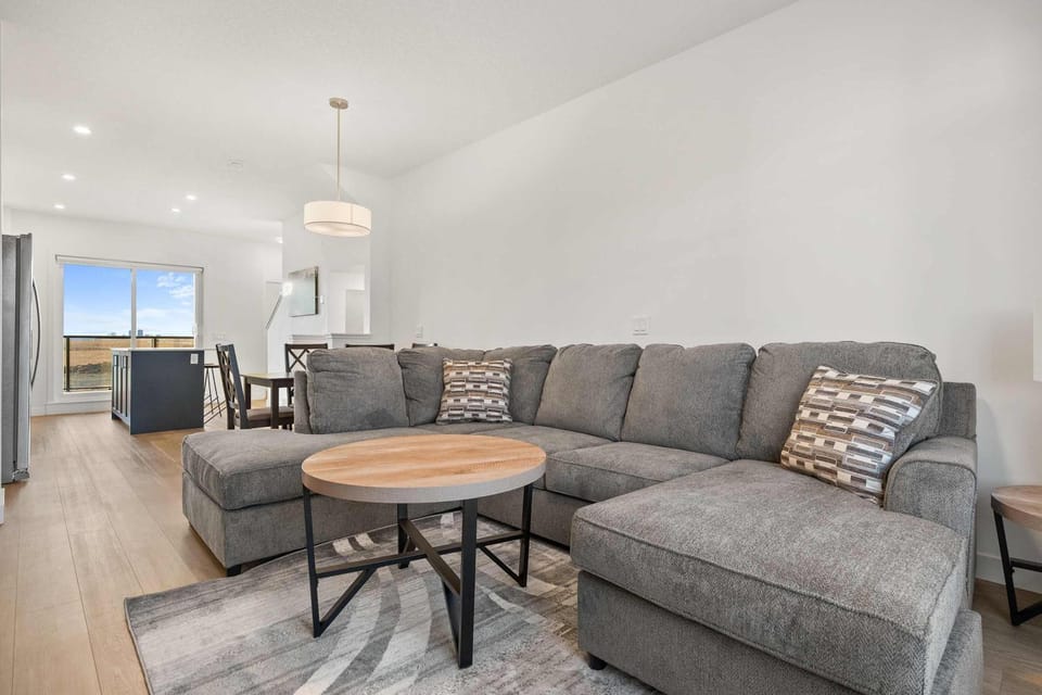 Skyline Retreat Spacious 4BR Home with Balcony! House in Calgary