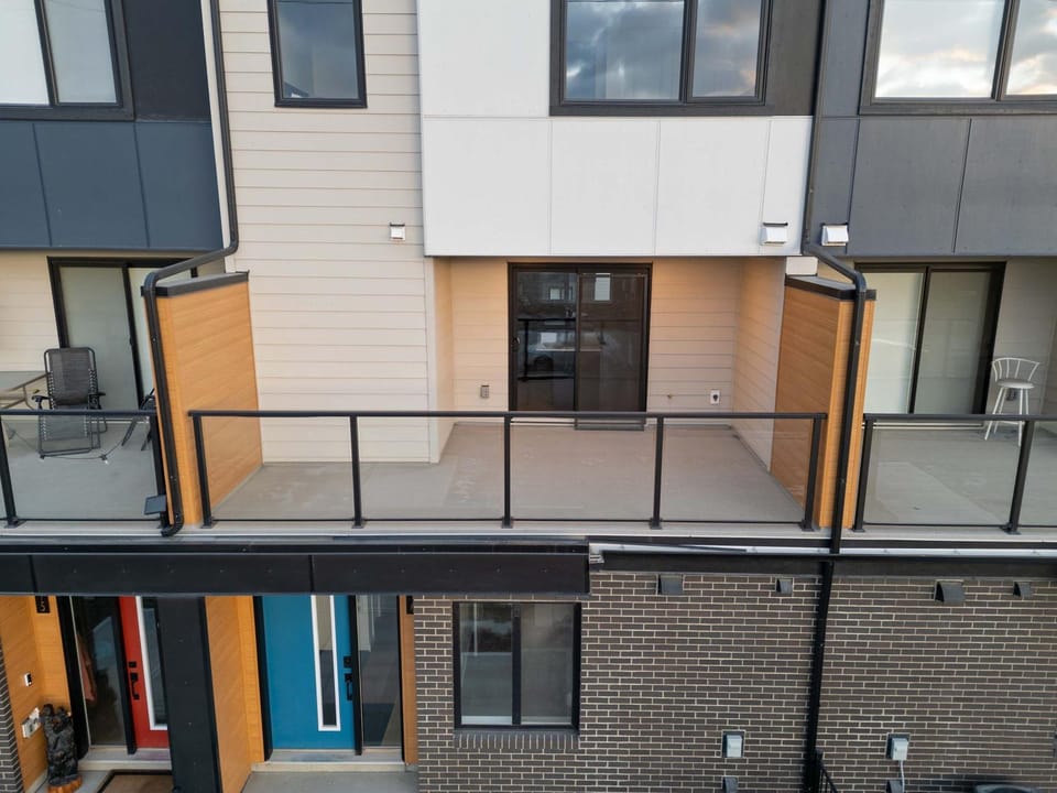 Skyline Retreat Spacious 4BR Home with Balcony! House in Calgary