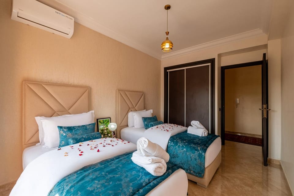 Bed, Photo of the whole room, Bedroom, towels, air conditioner