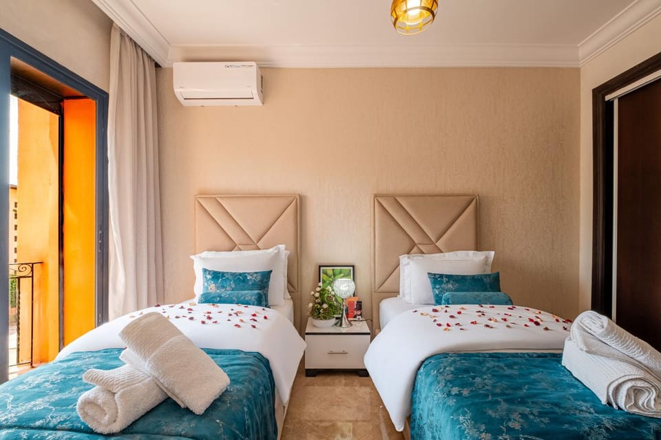 Bed, Photo of the whole room, Bedroom, towels, air conditioner