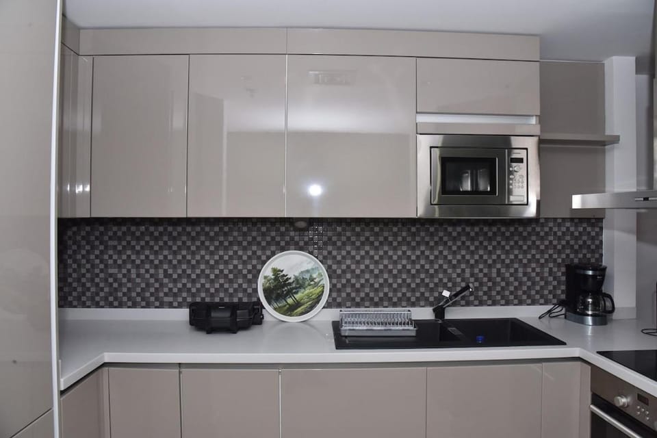 Kitchen or kitchenette, stove