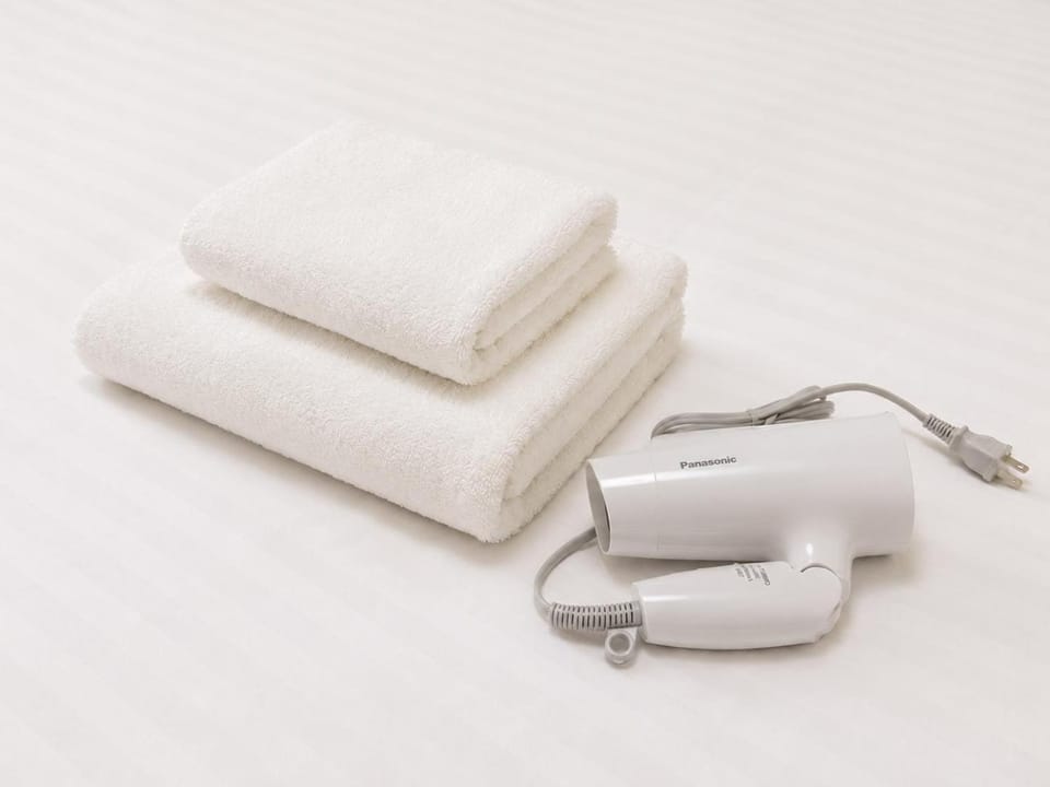 Bedroom, hair dryier, towels