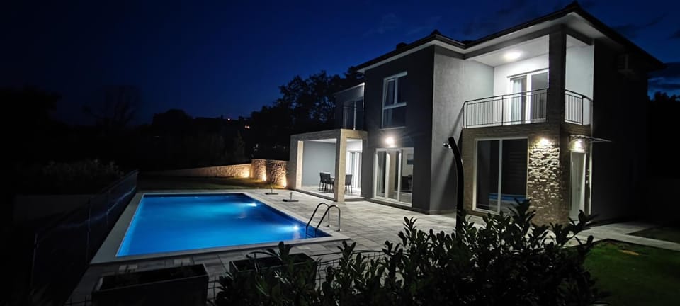 Property building, Night, Pool view, Swimming pool, sunbed
