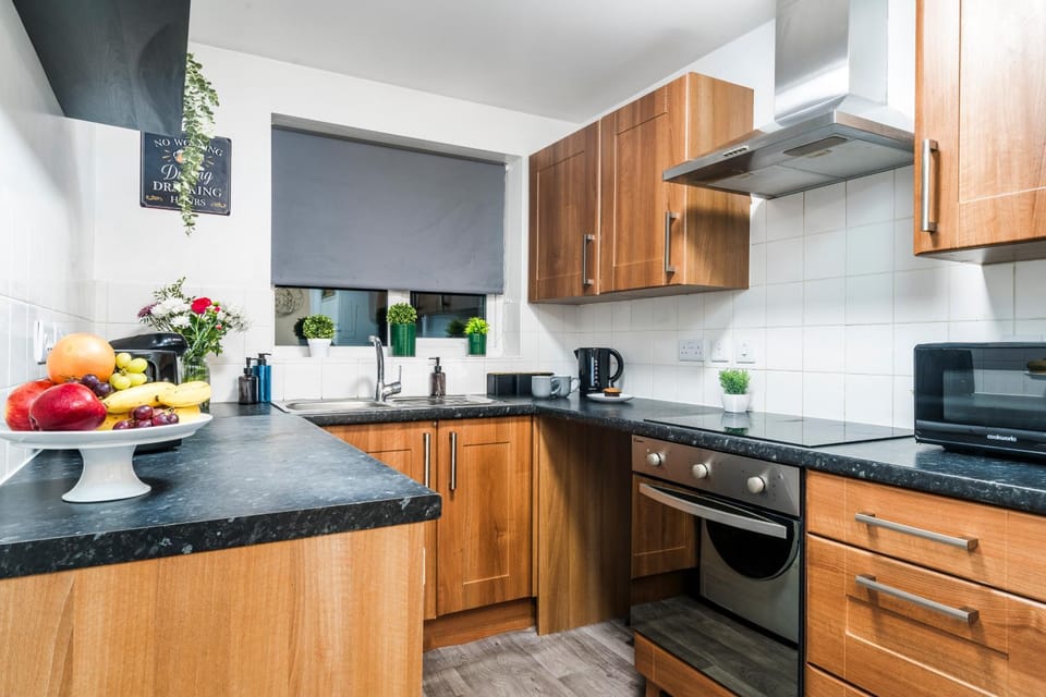 Kitchen or kitchenette, oven, stove, toaster