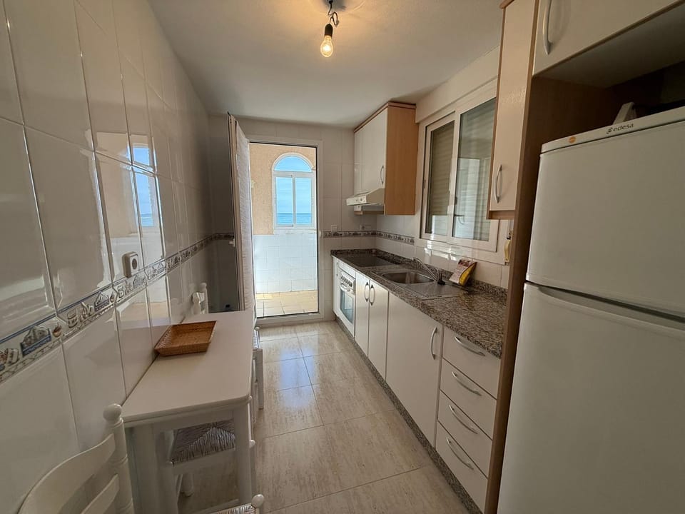 Kitchen or kitchenette, oven, stove