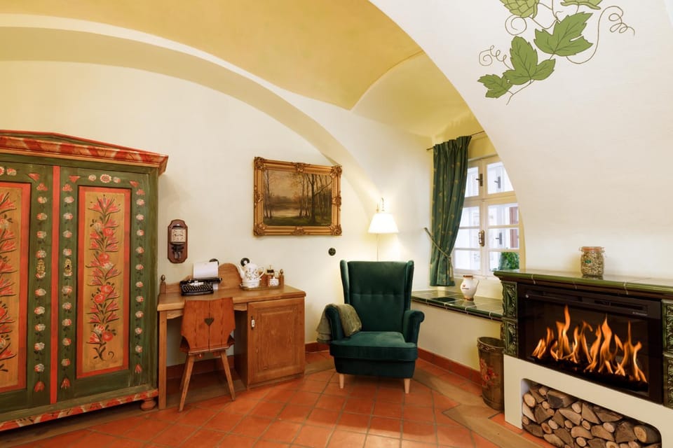 Seating area, fireplace, wardrobe